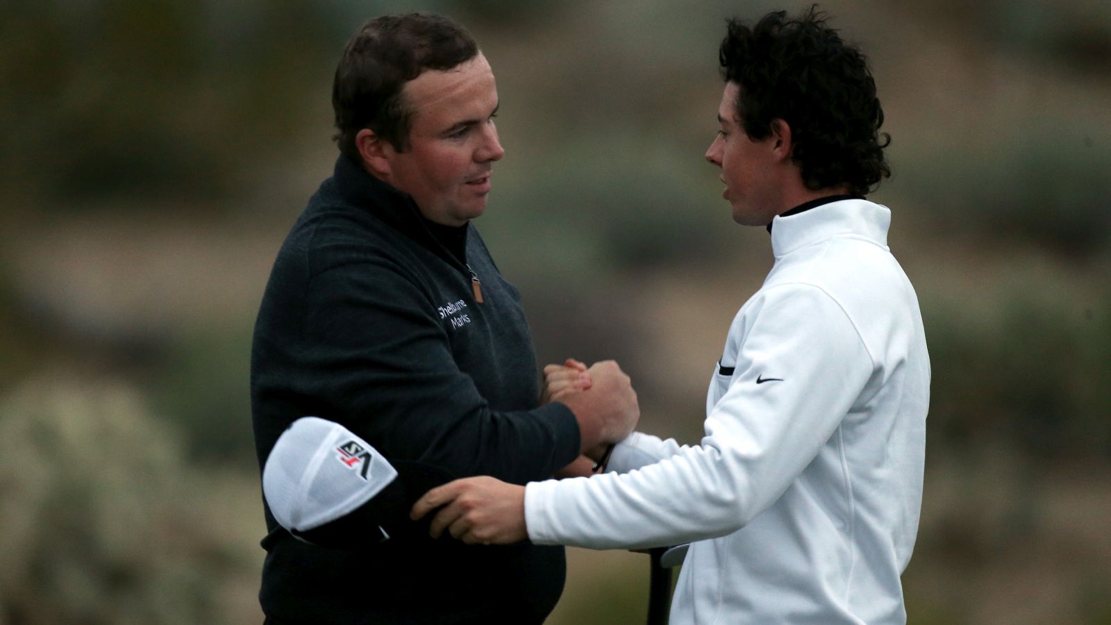 2013 - Lowry mit Rory McIlroy bei der World Golf Championship in Arizona. © Andy Lyons/Getty Images